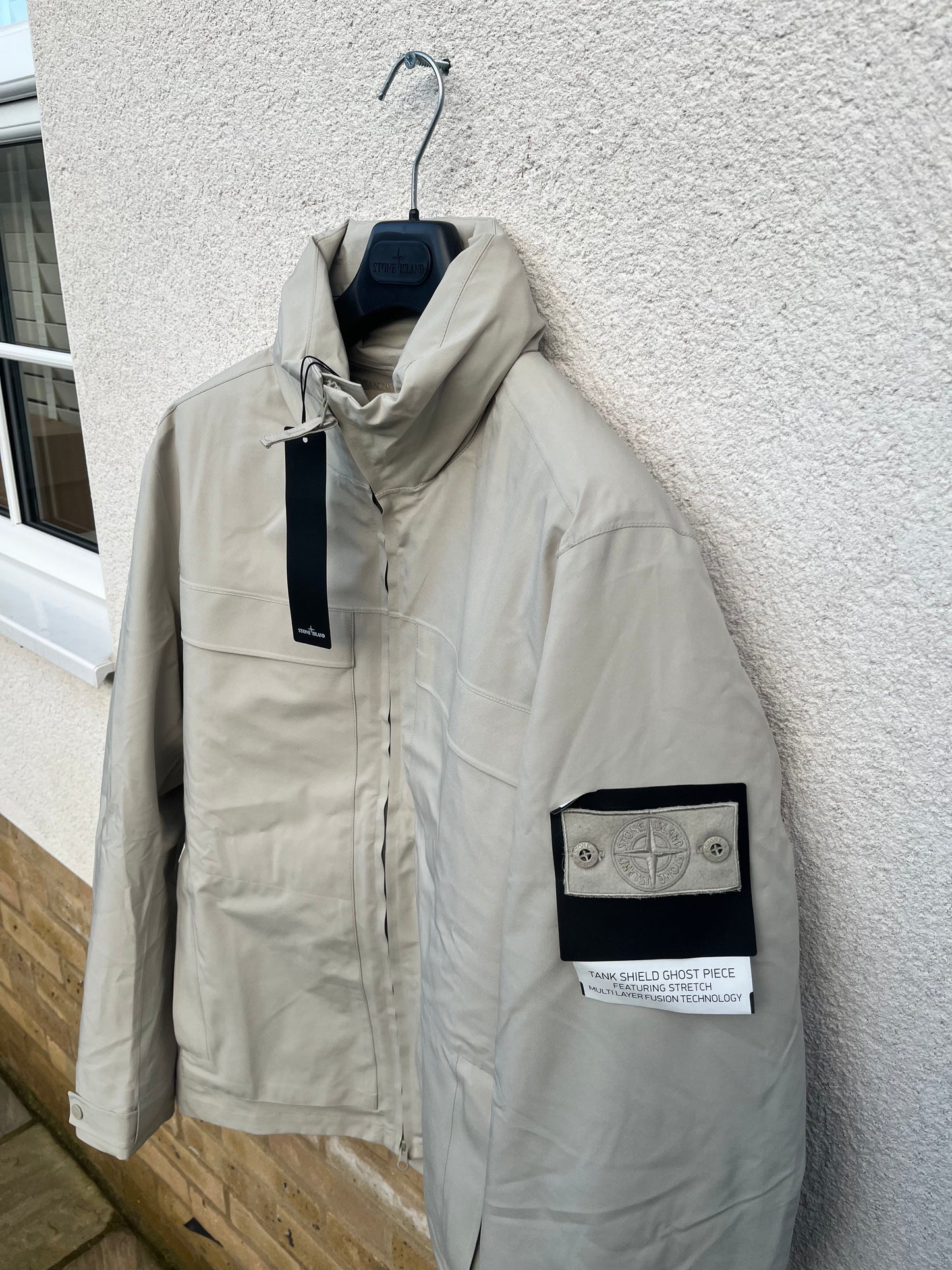 Stone Island Tank Shield Ghost Piece Featuring Stretch Multi Layer Fusion Technology (Cream)
